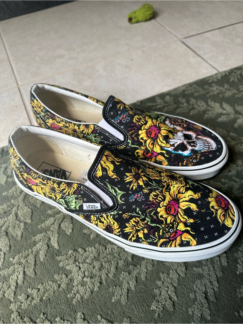 Vans Black Slip-On Sneakers with Yellow Floral & Multicolor Skull Graphic